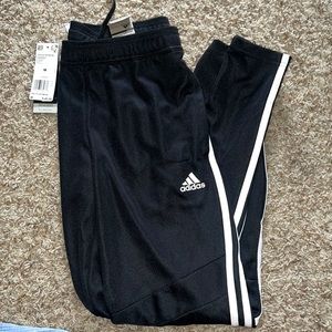 Never worn tag on adidas tapered pants black